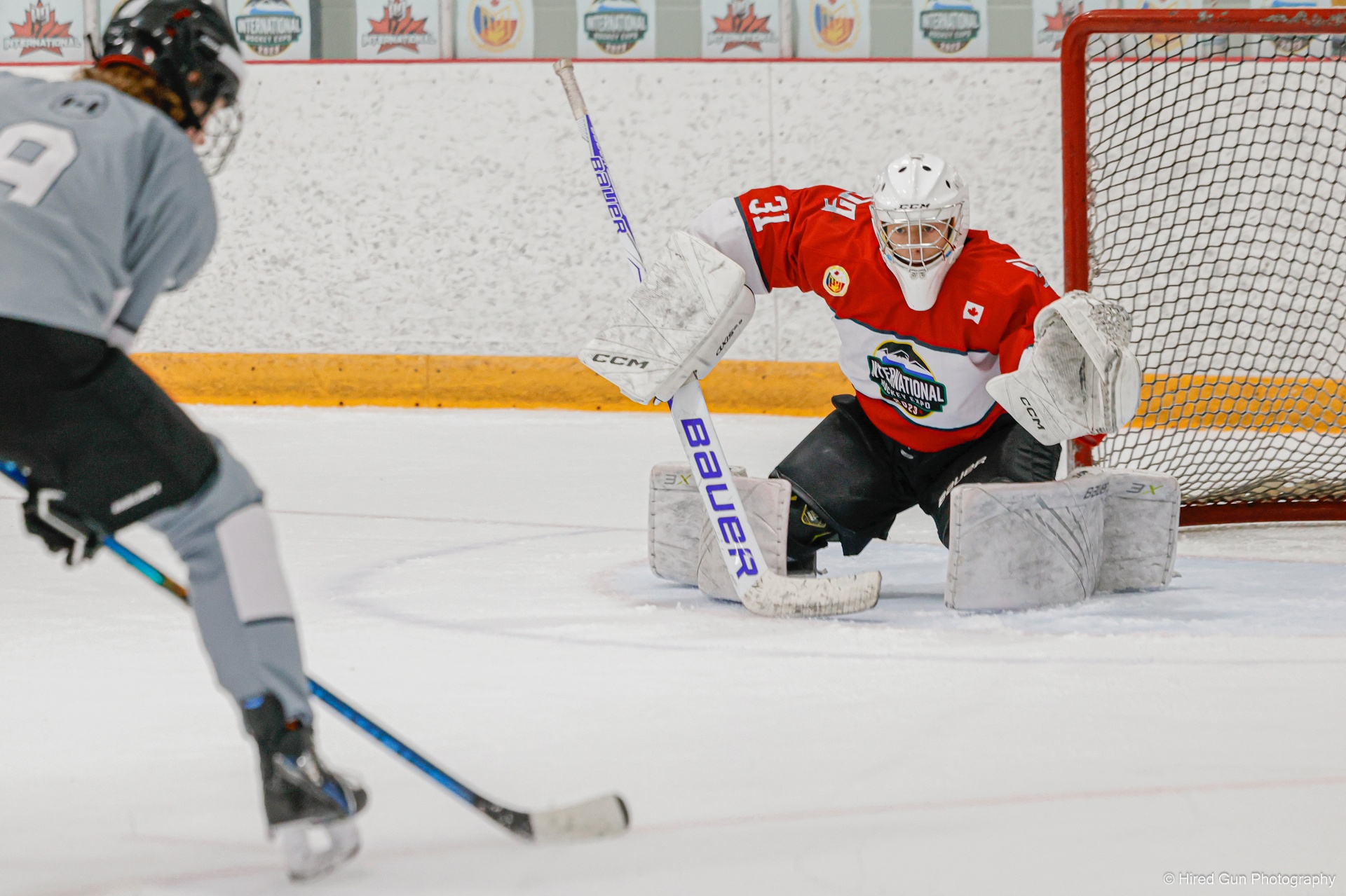 International Expo tournament play in front of the net